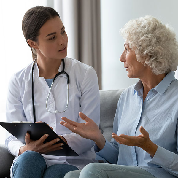 Exactech Knee Replacement FAQ Doctor talking with patient